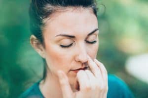 woman doing breathing exercise